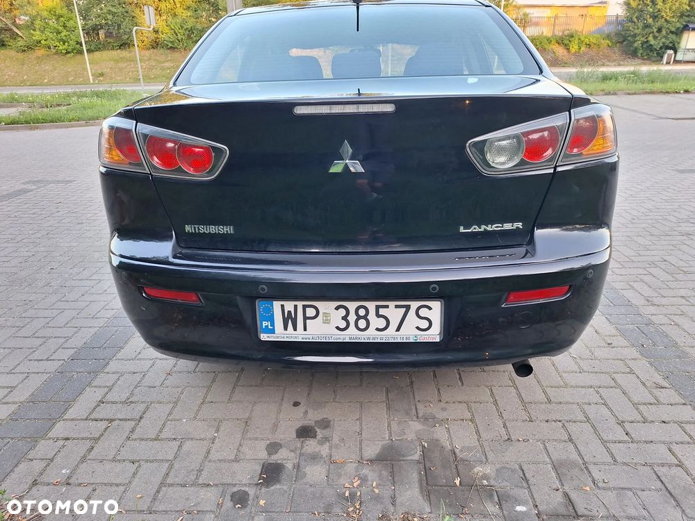Mitsubishi Lancer 1.6 Invite - 2
