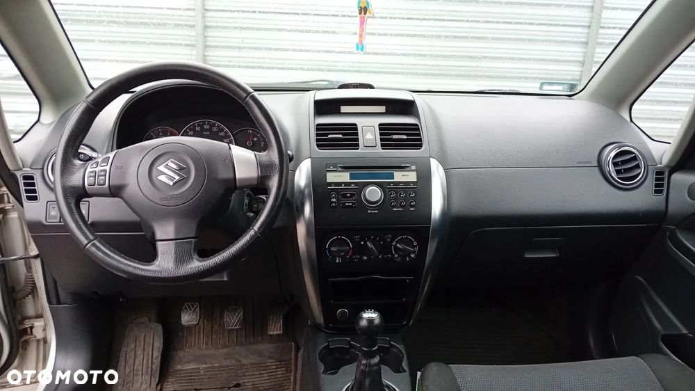 TYLKO CZĘŚCI Suzuki SX4 I 1.6 VVT 16V M16A 79kW 107KM SEDAN 06-09 lakier z2s - 9
