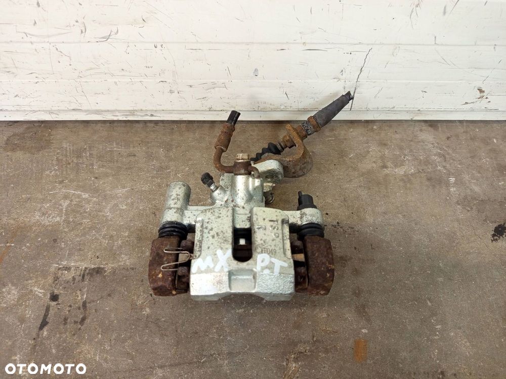 ZACISK PRAWY TYŁ TYLNI MAZDA MX5 MX-5 II NB