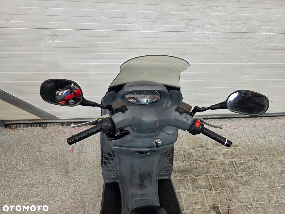 Suzuki Burgman - 27