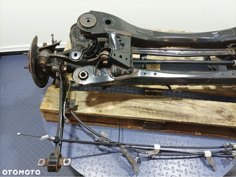 TOYOTA AURIS II LIFT KOMBI BELKA WÓZEK ZAWIESZENIA TYŁ - 6