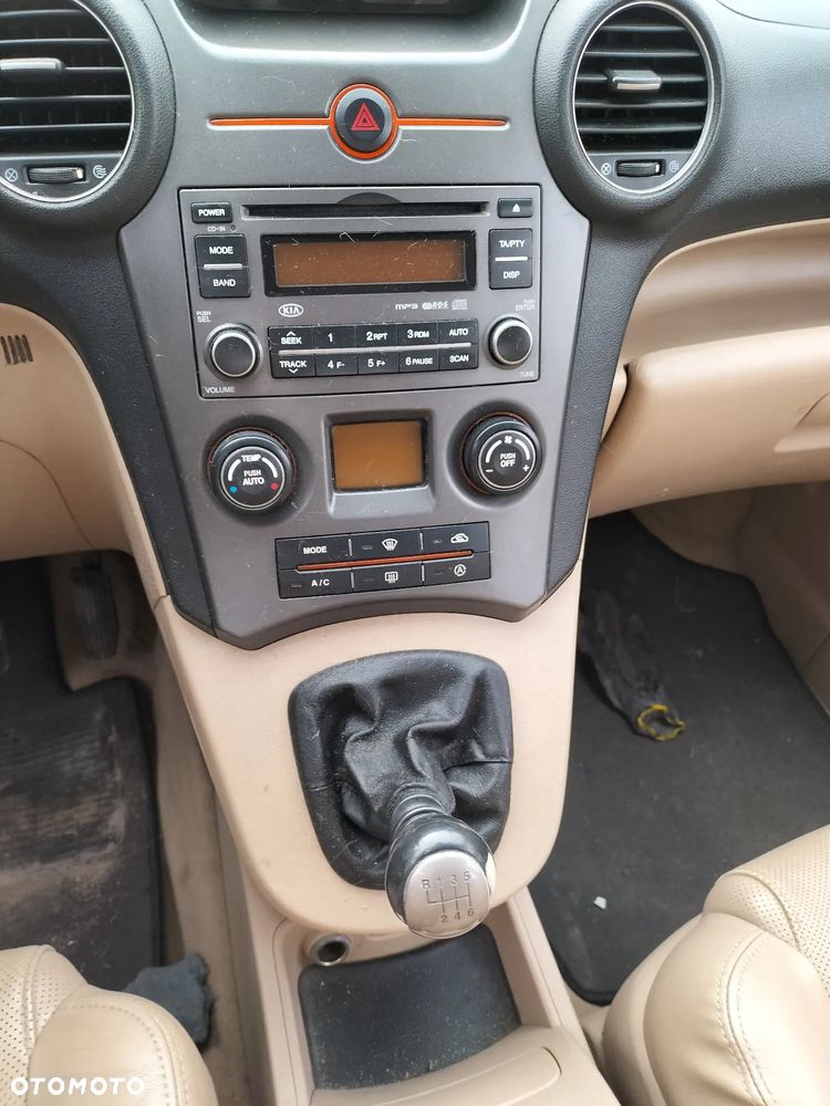 KOMPLET FOTELI  SKÓRZANYCH PRZÓD TYŁ 3 RZĄD KIA CARENS III 06-12r KOD LAK. 1U - 20