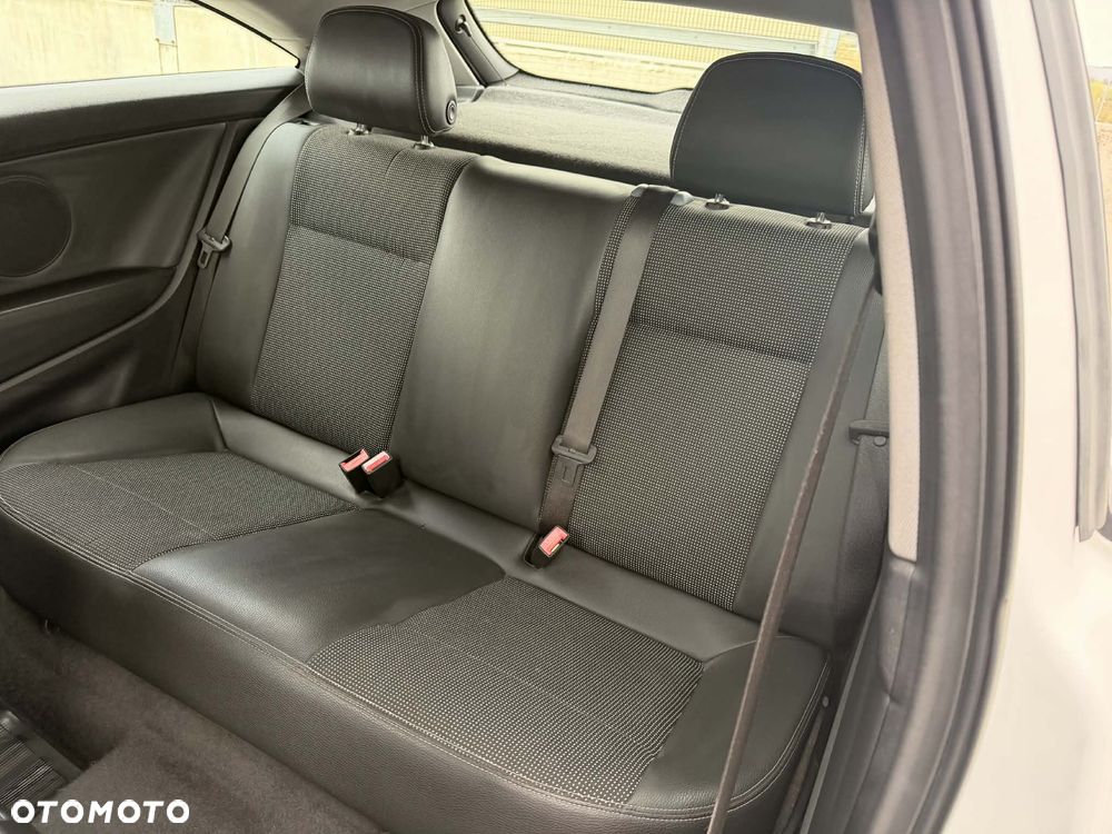Opel Astra 1.8 Cosmo - 12