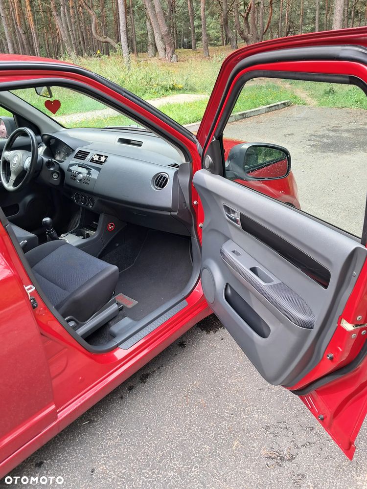 Suzuki Swift 1.3 Club - 7
