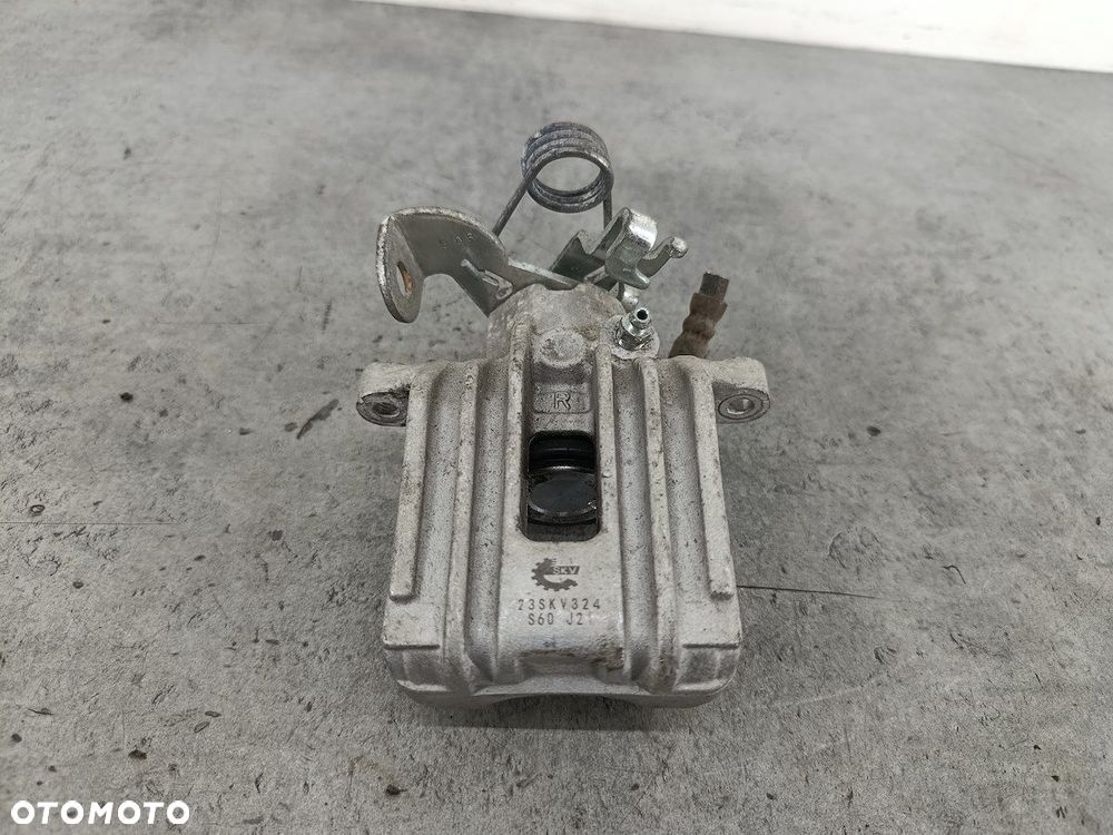 ZACISK HAMULCOWY PRAWY TYŁ AUDI A4 B6 23SKV324 SKV 1.9 TDI - 1