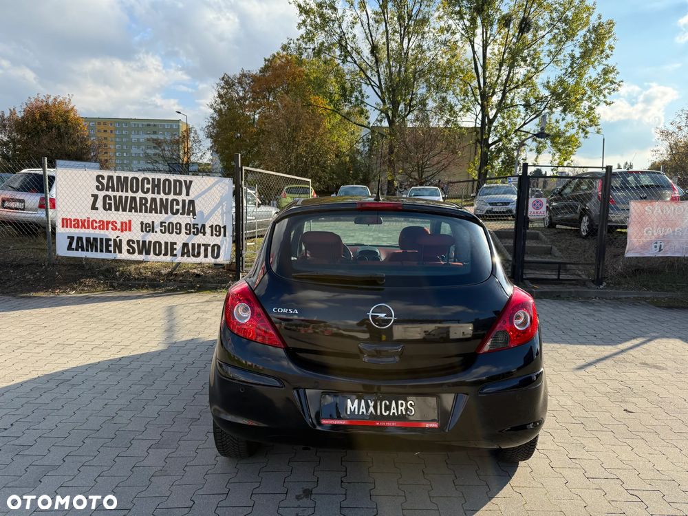 Opel Corsa 1.2 16V Cosmo - 11
