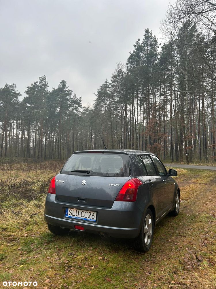 Suzuki Swift 1.3 Club - 8