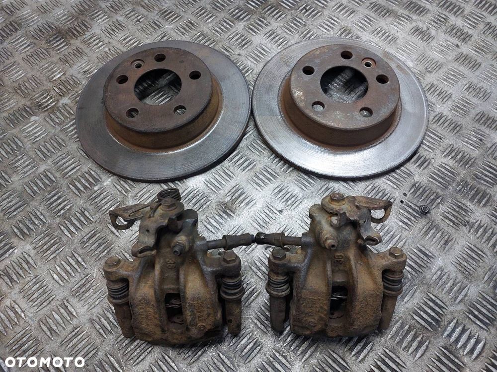 TARCZE HAMULCOWE TYŁ + KLOCKI + ZACISKI SHARAN MK1 GALAXY ALHAMBRA - 1