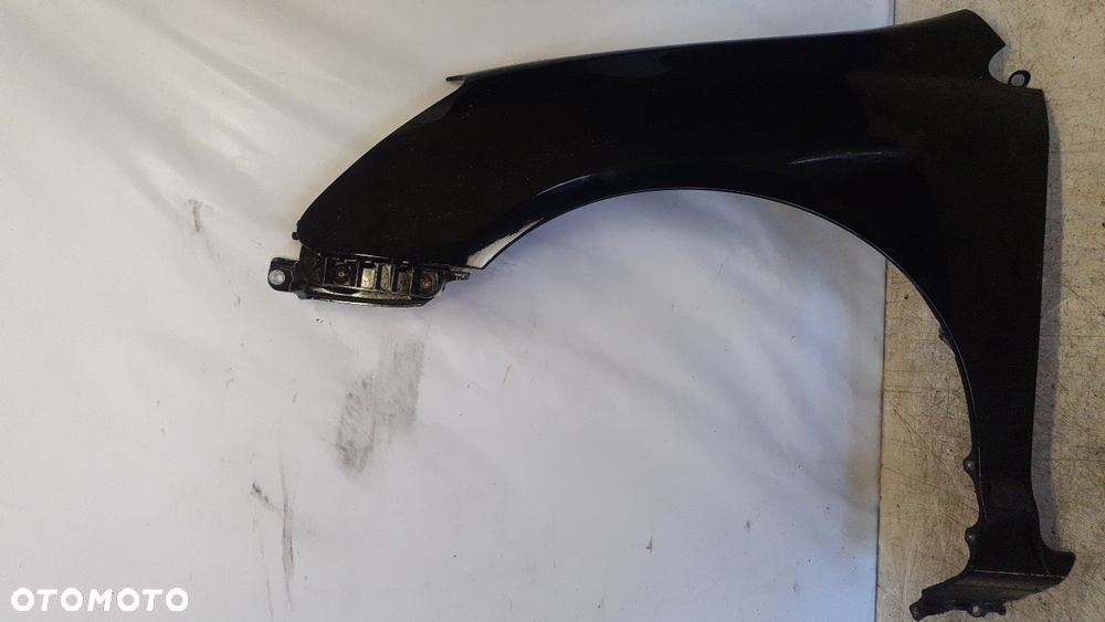 * BŁOTNIK LEWY DO HONDA CIVIC VII LIFT  B92P CZARNY - 1