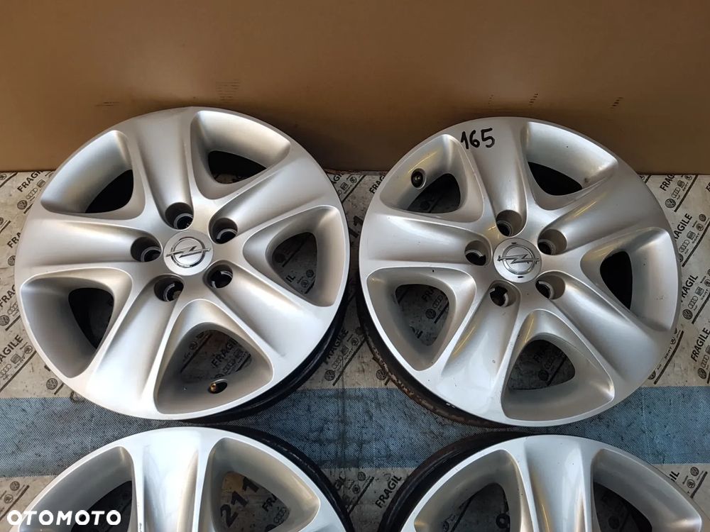 FELGI STALOWE+ KOŁPAKI  OPEL ASTRA H MERIVA B ZAFIRA B VECTRA C  5x110 6,5JX16 ET39 - 17