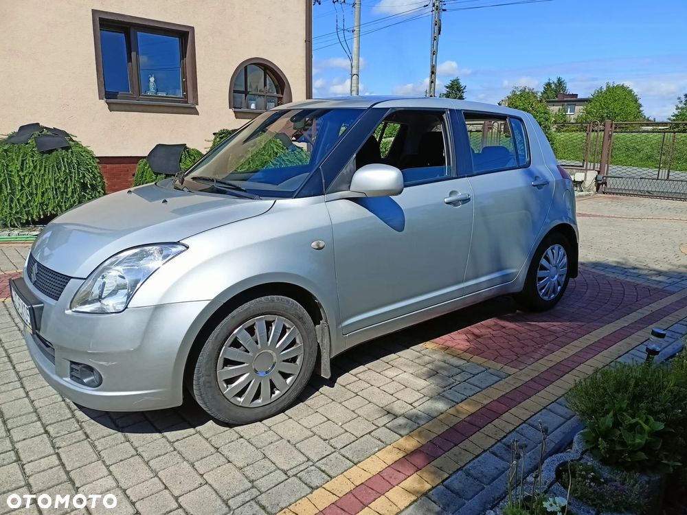 Suzuki Swift 1.3 Club - 8