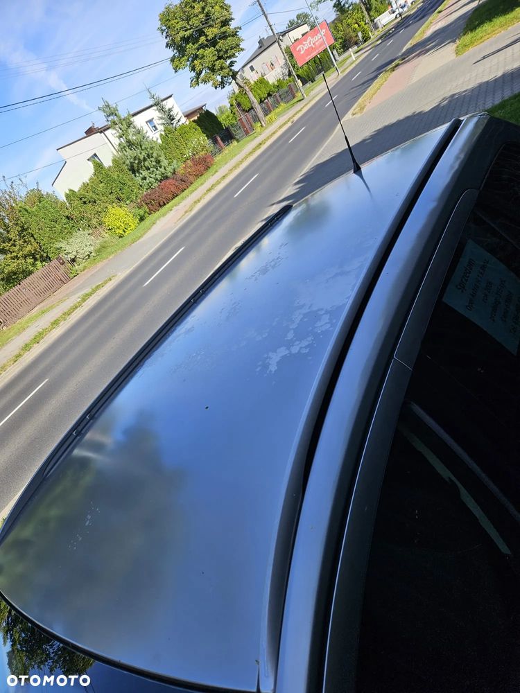 Opel Astra 1.6 Cosmo - 11