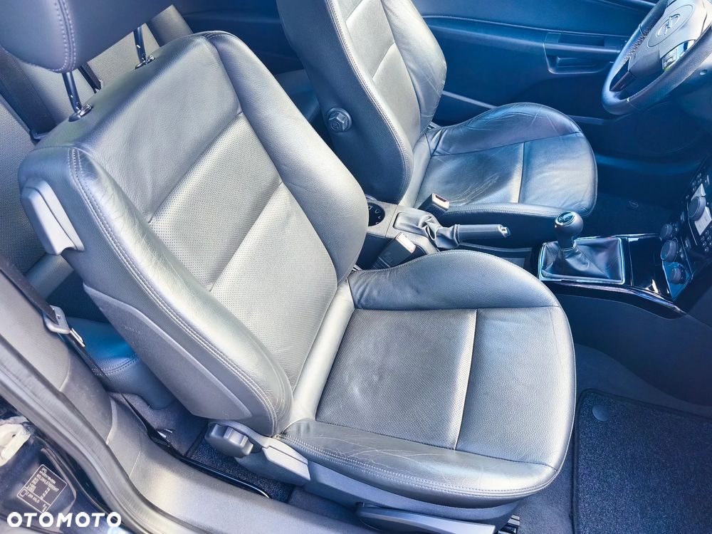 Opel Astra 1.8 Cosmo - 11