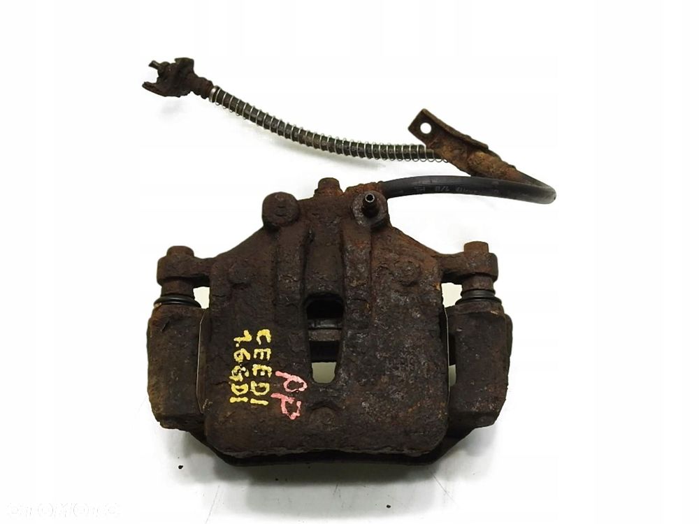 ZACISK HAMULCOWY PRAWY PRZÓD KIA CEED I 1.6 GDI - 1