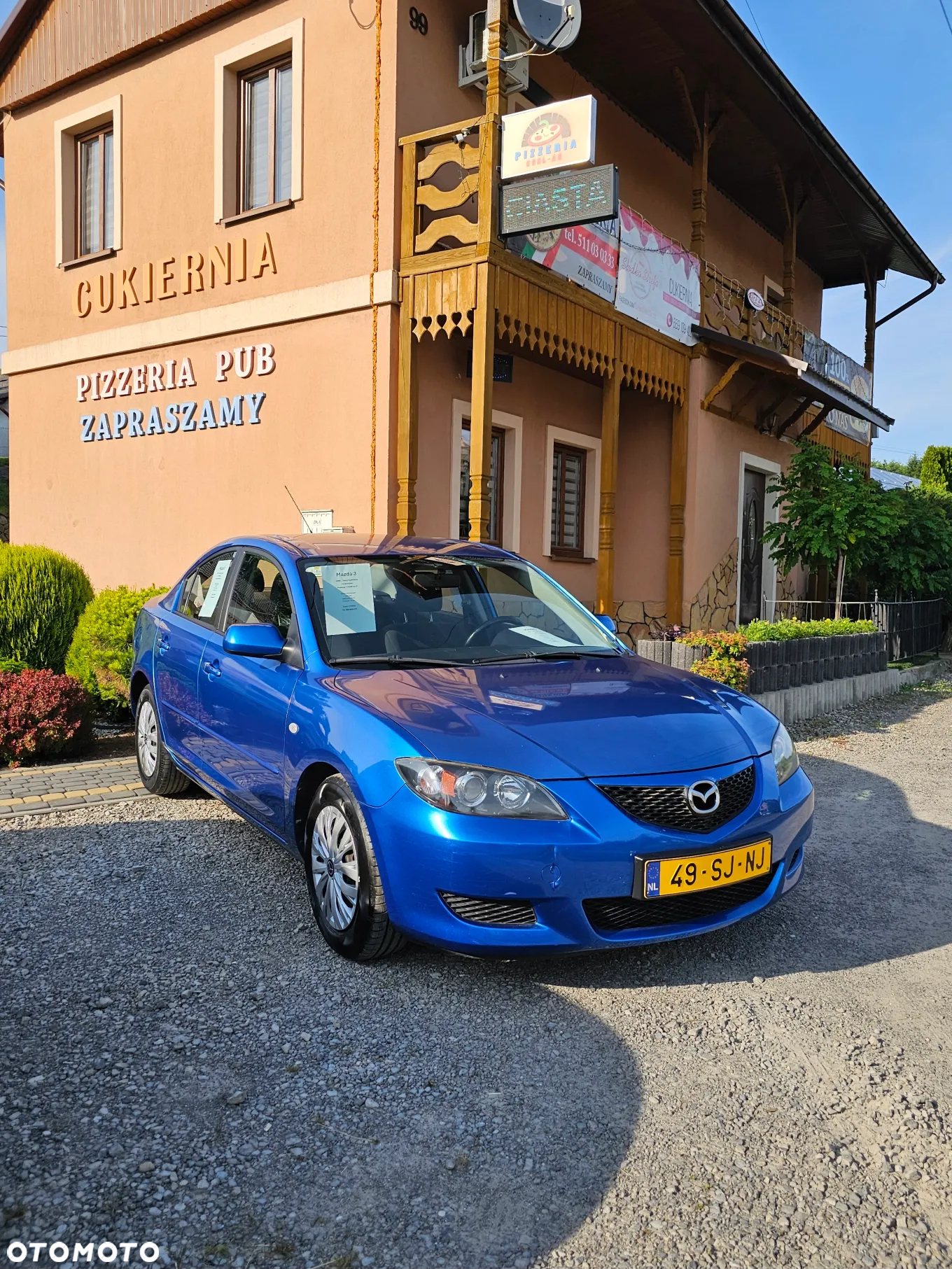 Mazda 3 1.6 16V Touring - 23