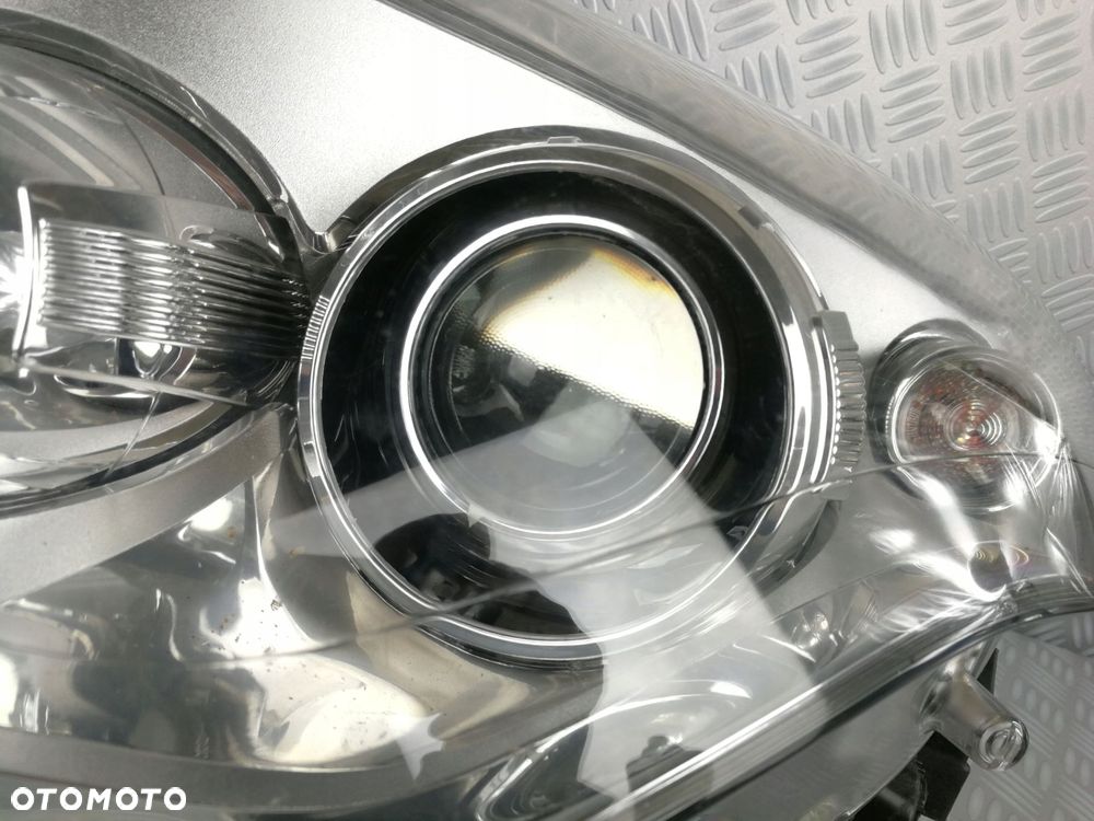 lampa reflektor prawy prawa lewy lewa przód przednia RENAULT LAGUNA III 3 - 6