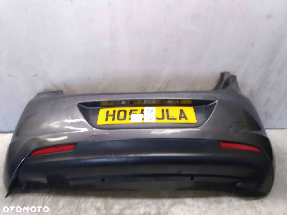 ^ ZDERZAK TYŁ TYLNY OPEL ASTRA J Z177 SZARY 5D 5 DRZWI HB - 1