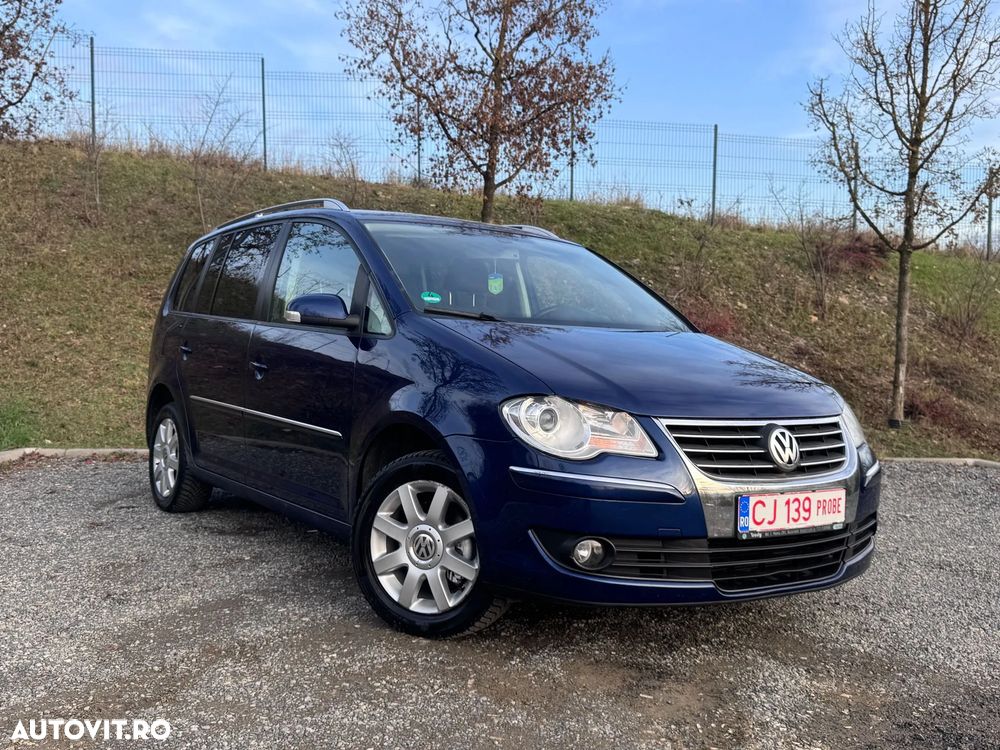 Volkswagen Touran 1.9 TDI DSG Highline - 1