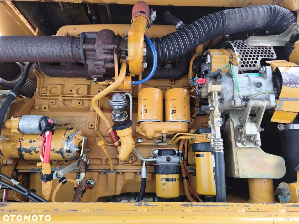 Caterpillar M316C - 12