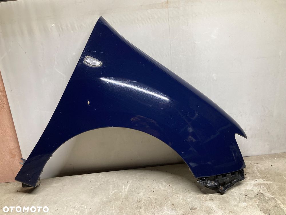 DACIA SANDERO II LOGAN II BŁOTNIK PRAWY PRZÓD PRZEDNI