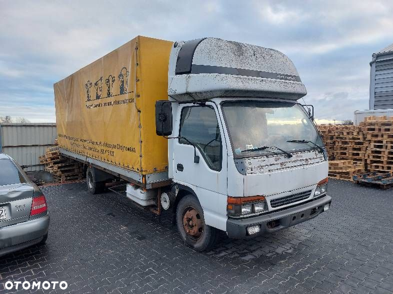 ZACISK HAMULCOWY LEWY + PRAWY PRZÓD ISUZU ELF NQR NPR - 7