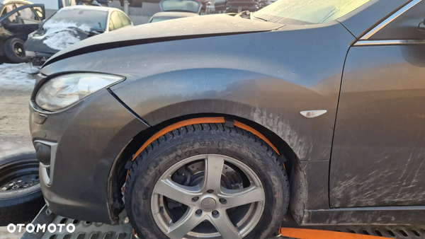 MAZDA 6 GH BŁOTNIK  LEWY PRZÓD 38R