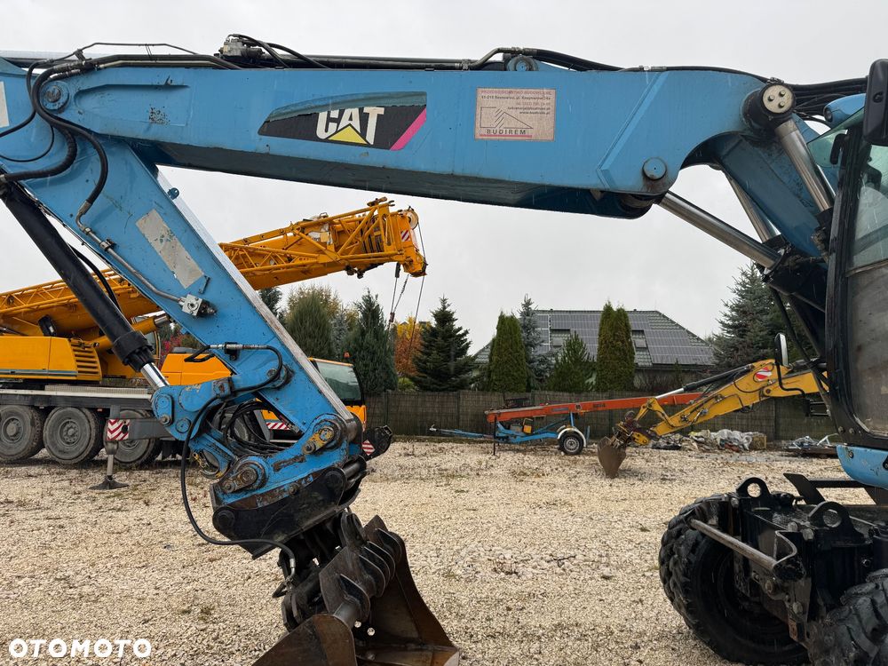 Caterpillar M322D - 2