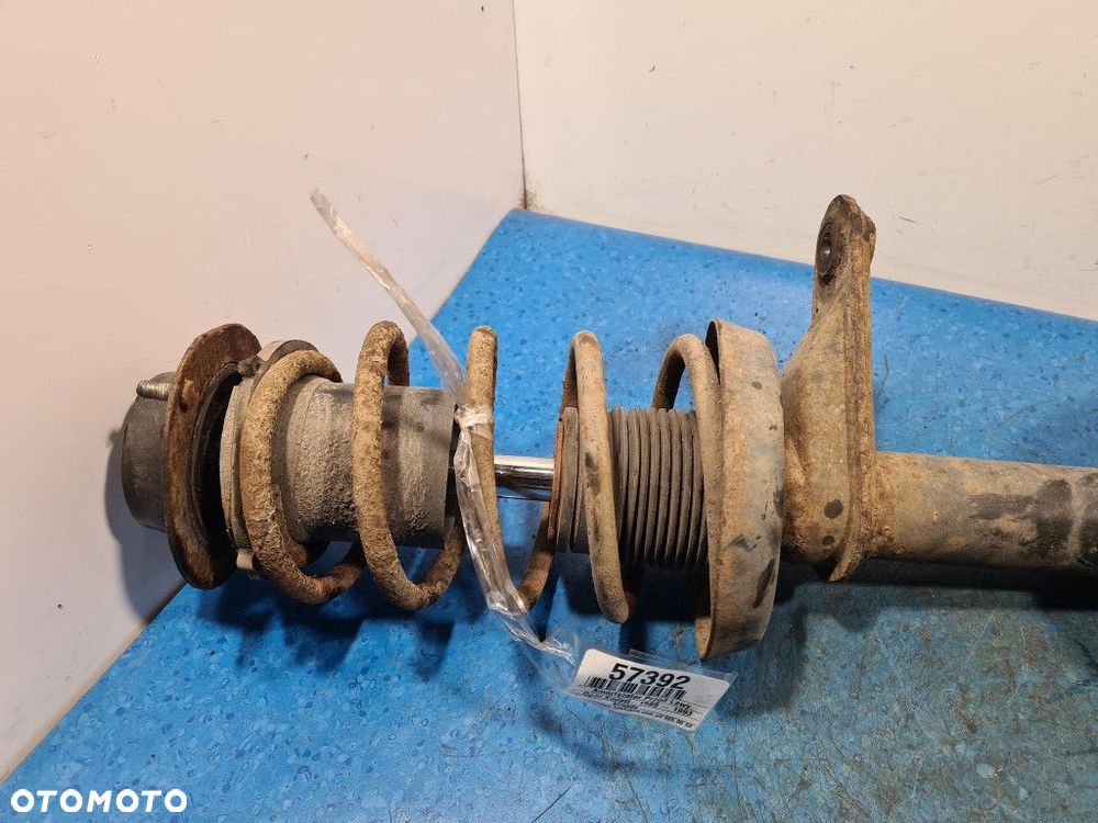 OPEL KADETT E LIFT AMORTYZATOR ZWROTNICA PRZÓD LEWY. - 2