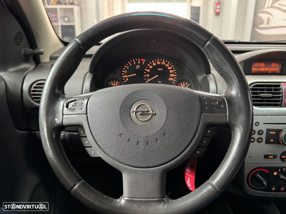 Opel Corsa 1.2 Twinport Cosmo - 23