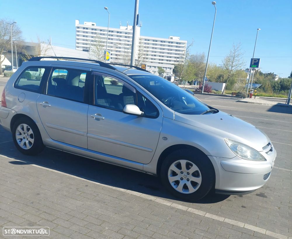 Peugeot 307 Break 1.4 HDi Navtech - 1
