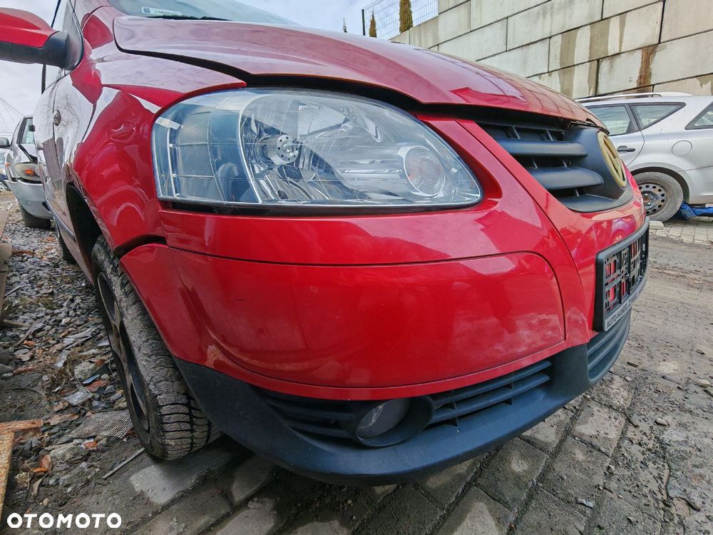 Lampa przód prawa lewa Volkswagen FOX 2007 r. - 12