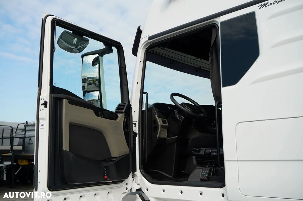 MAN TGX 26.470 / 6x2 / CORTINĂ / SOLO / 6x2 / 120 m3 / PUNȚĂ RIDICATĂ / I-PARK COOL / BALANȚĂ PODEA / - 25