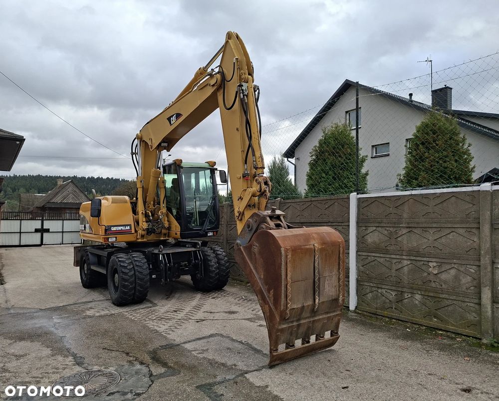 Caterpillar CAT M 313C - 12