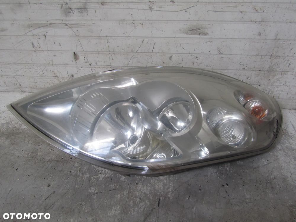 Opel Movano B 2.3 DCI reflektor lewy przód EU - 2