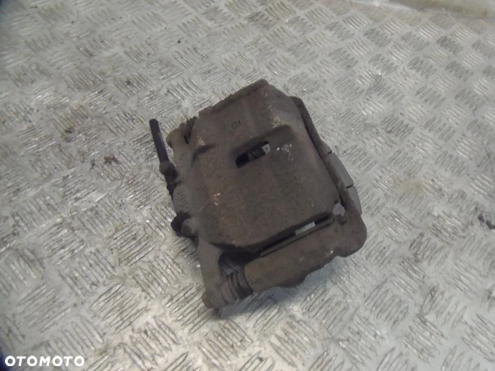 NISSAN QASHQAI J10 LIFT 1.6B 012R ZACISK HAMULCOWY LEWY PRZEDNI PRZÓD - 1