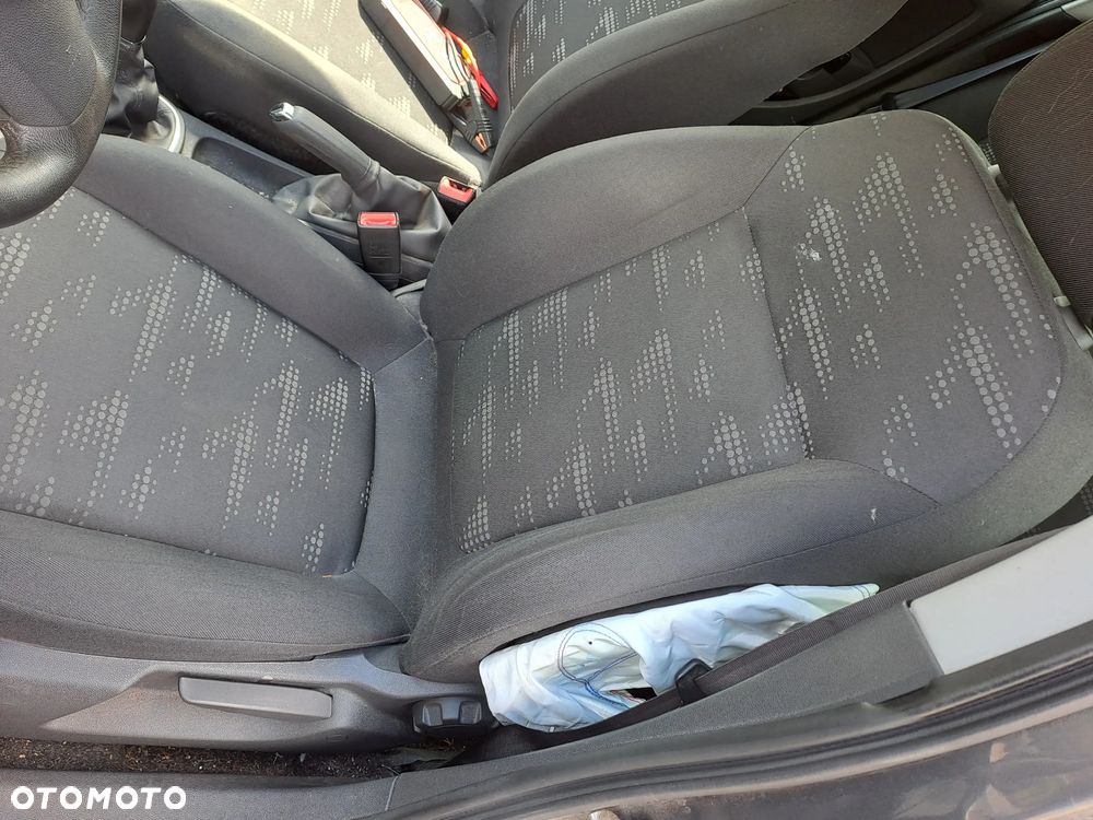 Opel Corsa 1.4 16V Cosmo - 12