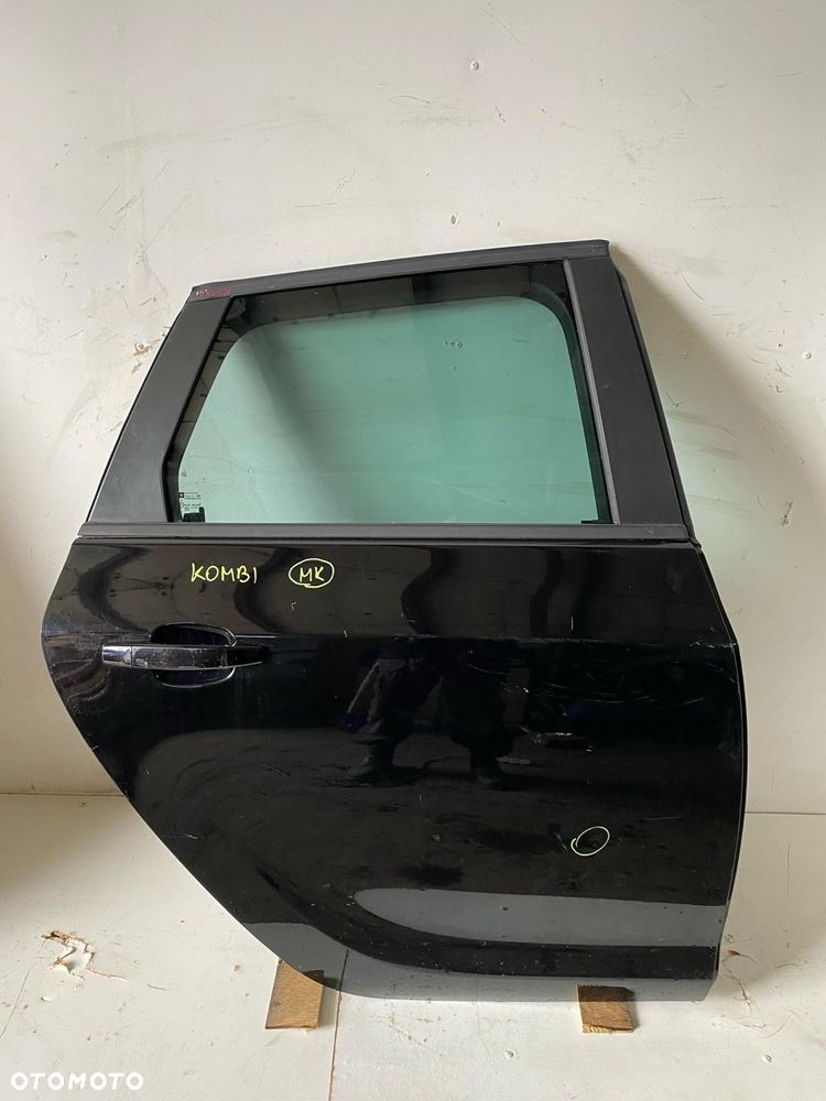 Opel Astra J Kombi drzwi tył prawe - 1