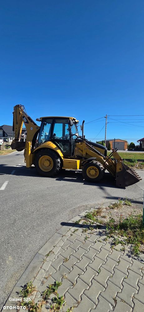 Caterpillar 428 E - 1