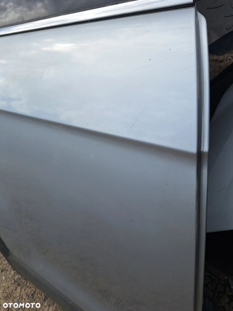 DRZWI PRAWY TYŁ- CHEVROLET CAPTIVA 2006-10rok / SREBRNE - 4