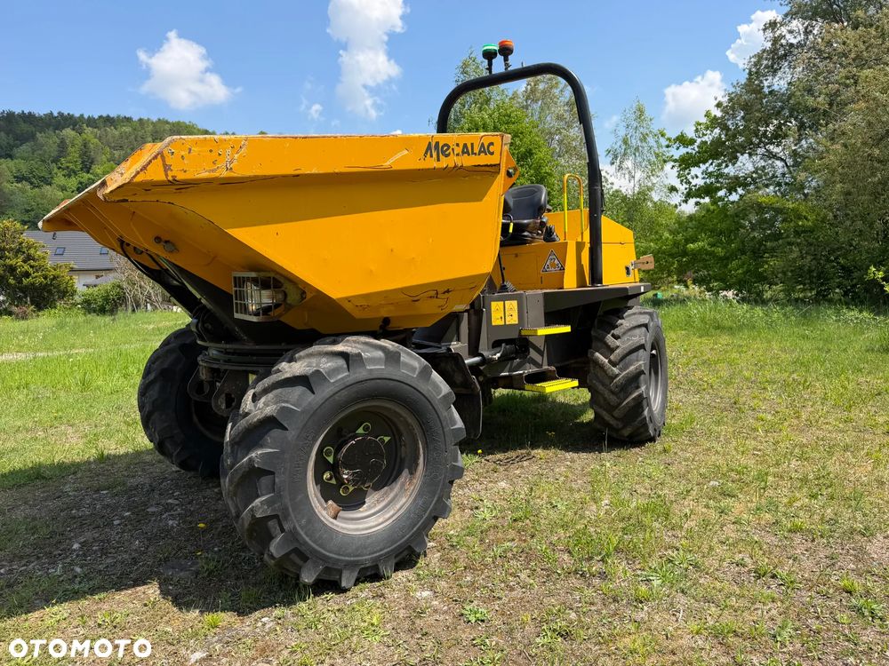 Terex Mecalac TA6s Wozidło wózek z Obrotową Kolebą. 6 ton ładowność. 4x4. Silnik Perkins. 4 cylindry. 808 mtg. 2022 rok. Kamera z wielkim Ekranem! Jazda Rewers 3prędkości. Maszyna jak Nowa z Norweskiego Gospodarstwa! Ani deka luzów i wycieków! Hydrostatic. Pełny Oryginał. Hamulce brzytwa. Serwisy w DEKRA. Maszyna Woziła lekkie ładunki. Praktycznie zerowe zużycie. Wielka Okazja. Wszystko w pełnym Oryginale. Opony Oryginał wszystkie jak Nowe. Komendy Głosowe w maszynie! - 2