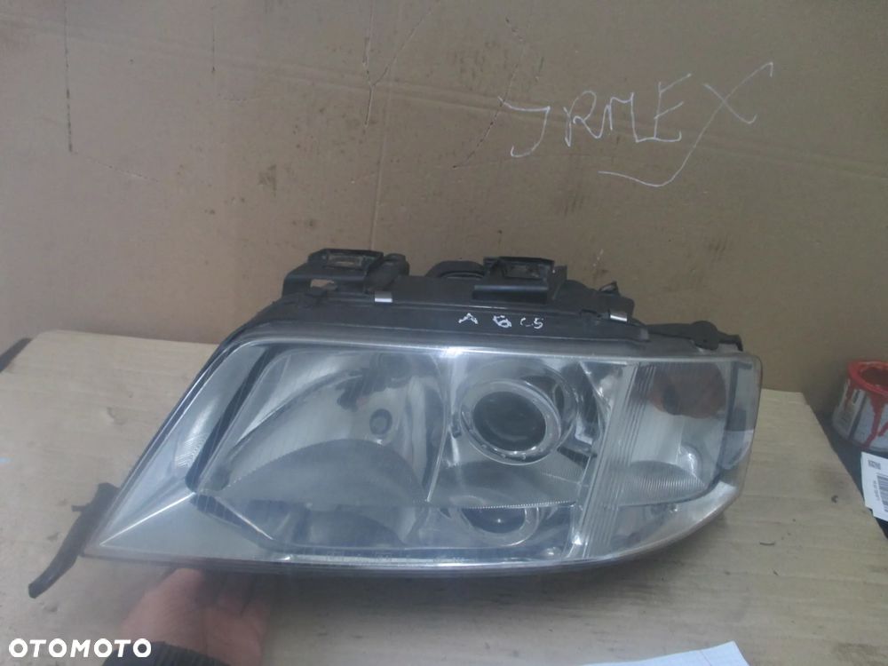 lampa lewa Audi A6 C5 Hella Europa orginał