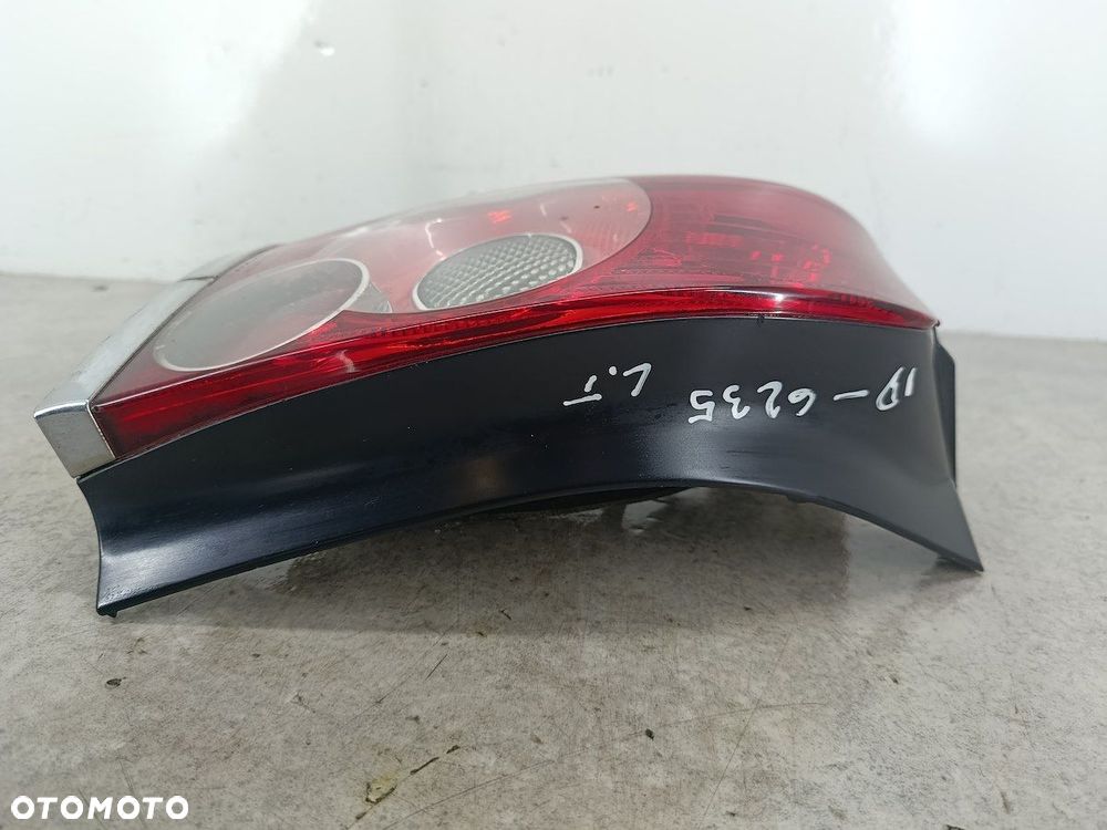 LAMPA TYLNA LEWA TOYOTA AVENSIS II T25 KOMBI - 6