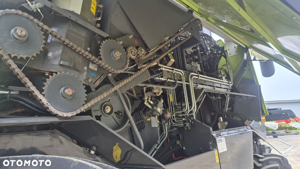 Claas Lexion 750 z hederem - 9