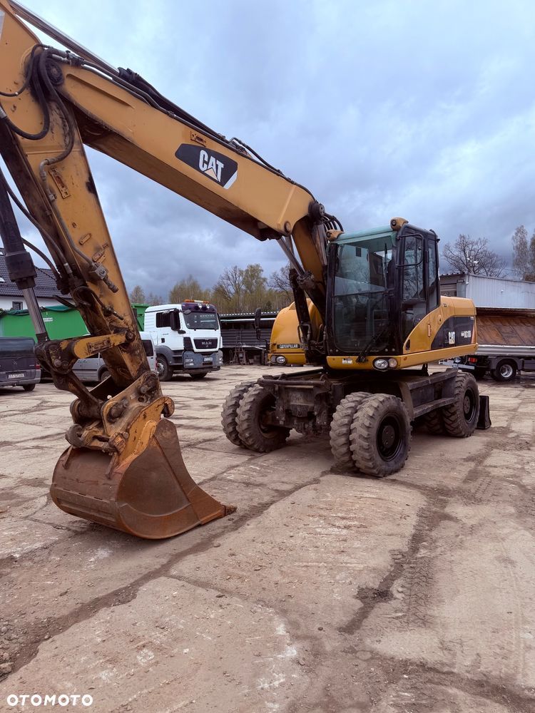 Caterpillar M318d - 13