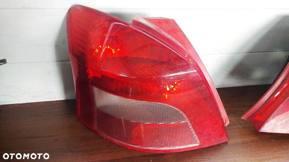 Lampa lewy prawy przód tył Toyota Yaris II 5D - 11