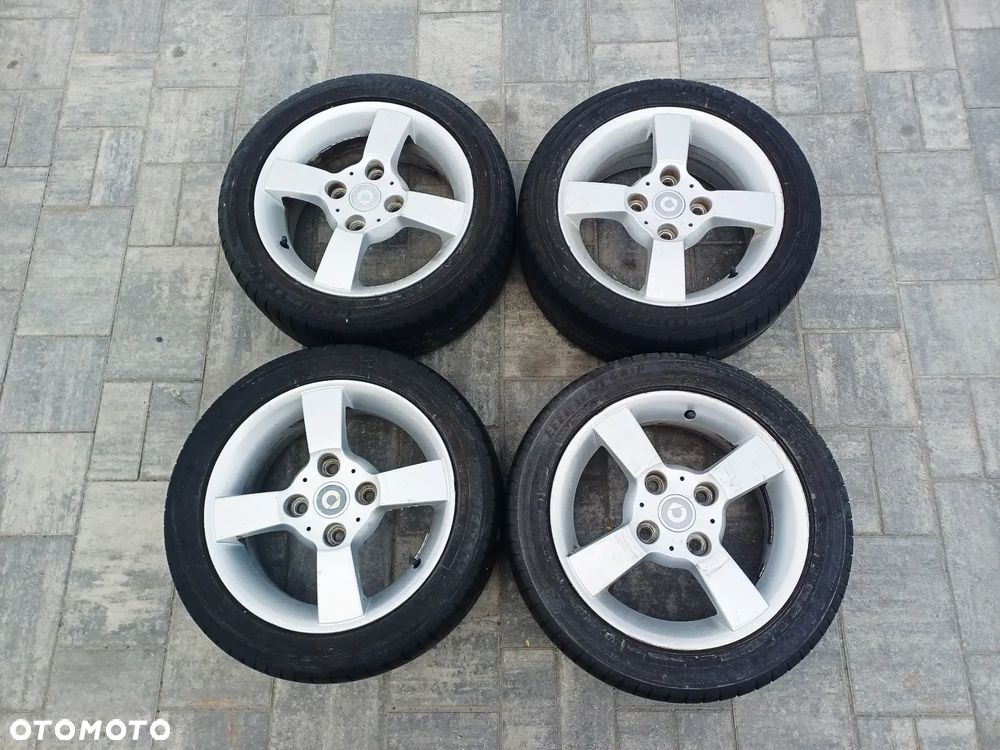 FELIGI Z OPONAMI ALUMINIOWE SMART FORFOUR R15 4X100 60.1mm OPONY 195/50 R15 LATO NR4