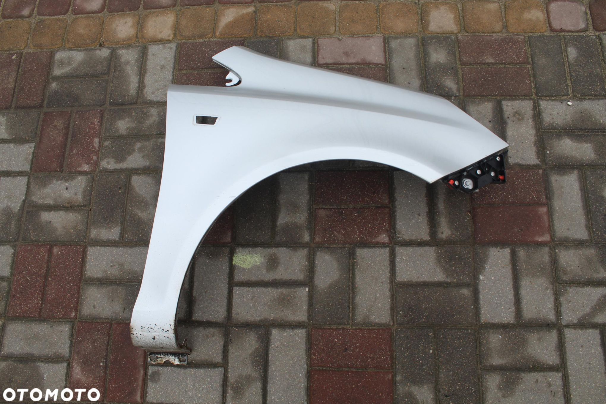 BŁOTNIK PRAWY PRZÓD Z157 OPEL CORSA D - 1