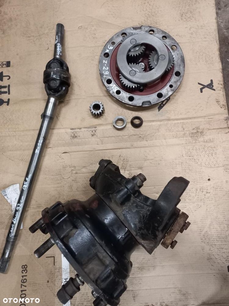 Części Case Maxxum IH 5120,5130,5140,5150,580K most 709/S2,półoś długa 81881C2,obudowa zwolnicy K395123,pokrywa,układ planetarny 81888C1,wieniec Z-75,9968069,koło zębate Z-29,N13513,koło K395126,półoś krutka Z-22,N14409,mechanizm różnicowy 109686A1,1349056C1,koło talerzowe 11z/32z , atak,81876C1 - 6