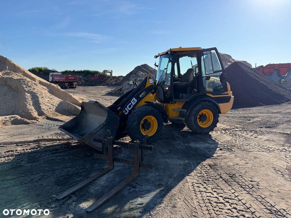 JCB 409 - 1