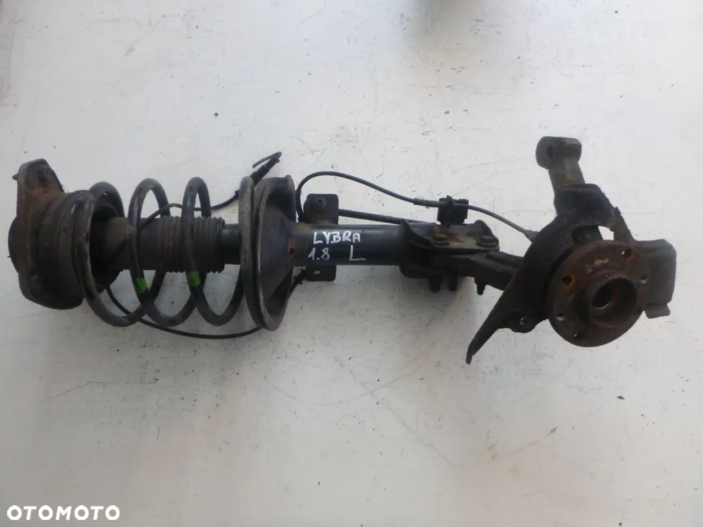Lancia Lybra 1,8 16V amortyzator mcperson lewy - 1